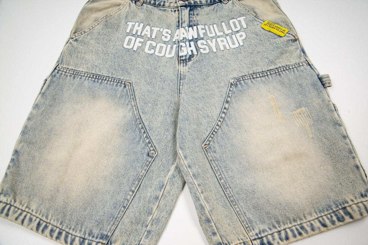 THAT'S A AWFUL LOT OF COUGH SYRUP Washed Denim Graphic Shorts ¡ª front